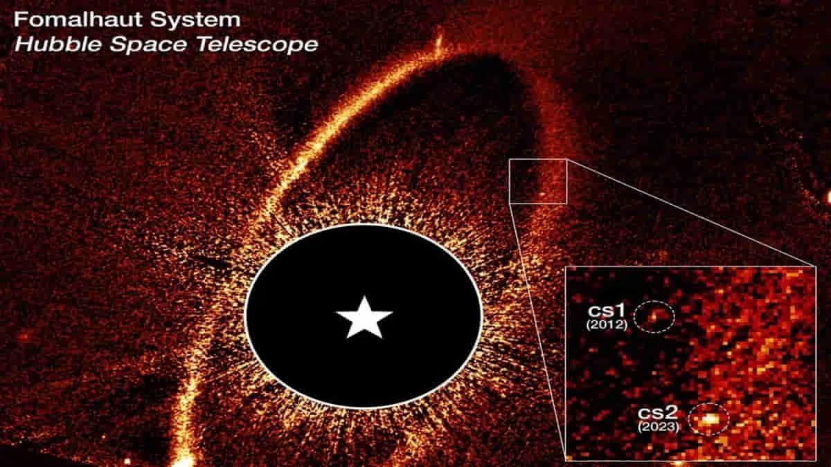 Gambar komposit Teleskop Luar Angkasa Hubble menunjukkan cincin puing dan awan debu cs1 dan cs2 di sekitar bintang Fomalhaut. Foto: istimewa/net